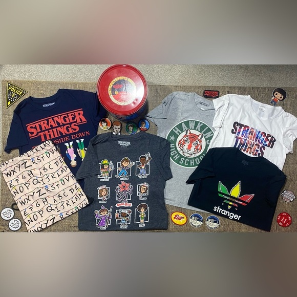 Stranger Things 20 Piece Bundle: Metal Tin, 14 Patches, Backpack, 5 T-shirts - Picture 1 of 16